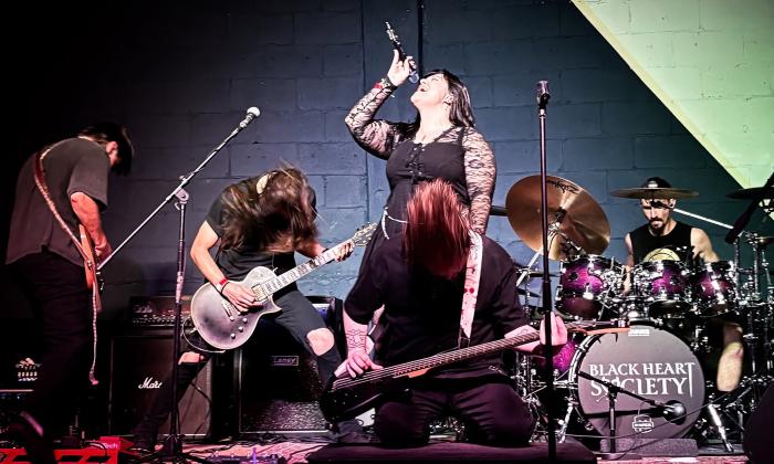 Black Heart Society captured in action during a performance