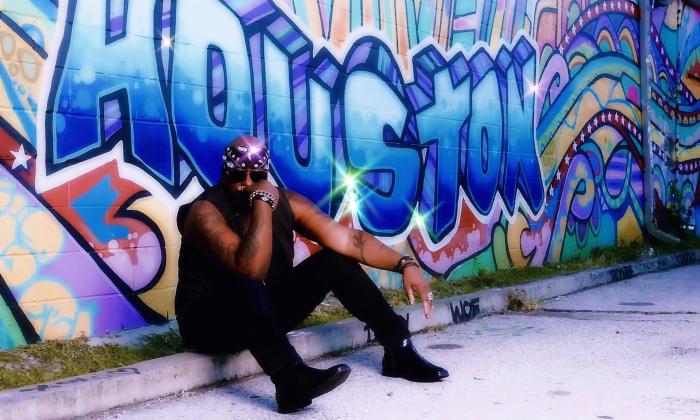 The artist sitting on a stoop
