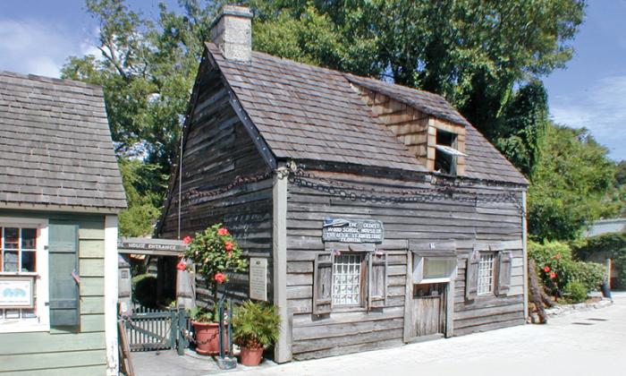 A coupon for Oldest Wooden School House 
