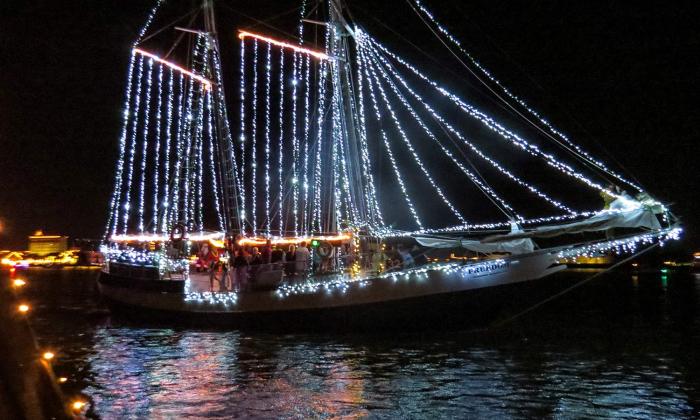 Watch holiday magic float down the Intracoastal Waterway in Palm Valley’s annual boat parade. 