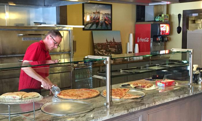 A coupon for St. Augie's Pizza 