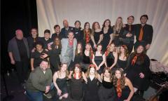 Three rows of the Key of Seas student choir at Flagler College