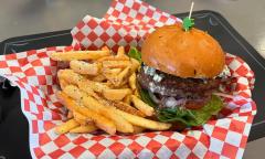 Cafe Cairano's Bruno's black and blue burger, with shoestring fries