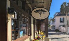 Exterior sign and entrance to Acacia Tree Gallery on Aviles