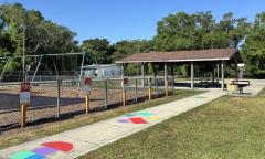 Colorful sidewalk designs leading to the picnic pavilion