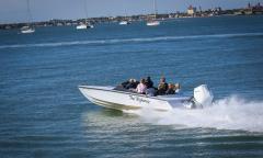 "The Highway" boat taking guests out on the water