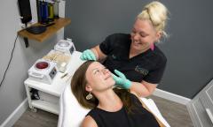 A client getting a facial treatment