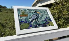 One of the colorful bird mosaics