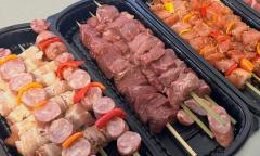 Various meat kebabs laid out