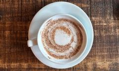 A hot latte served in a mug