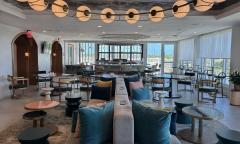 Tables and seats taking up the dining room