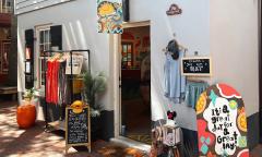The exterior of Stay Sunny Boutique on a sunny day
