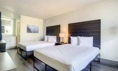 A room with two queen beds at Stayable St. Augustine