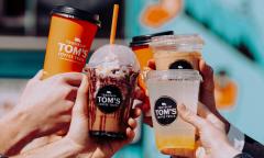 An assortment of drinks held up