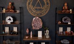 Assorted crystals displayed on shelves