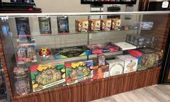 A glass display of games and cards