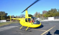The yellow Robinson R44 for Leading Edge Helicopters