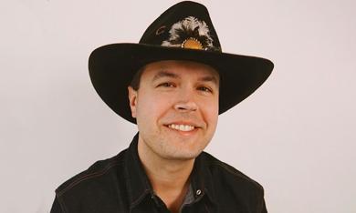 Adam James wearing a cowboy hat in his profile picture.