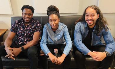 Experimental jazz band Whim smiles for the camera while sitting on a small leather couch with a bright and positive setting. The band is known for its refreshing jazz covers of classics such as "Tennessee Whiskey," "Killing Me Softly," and others. The band is known to play at The band is known to perform at venues such as Prohibition Kitchen, Flying Iguana, Island Girl, and others. 