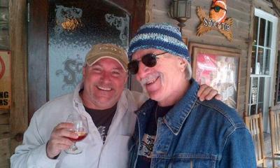 musicians John Winters and Mark Rickey enjoying a toddy