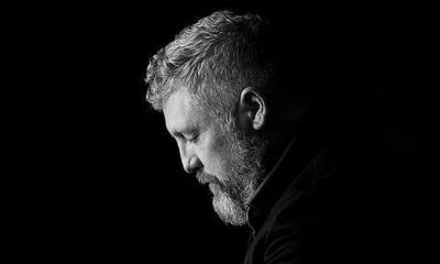 keyboardist Christopher Shawn, shown in profile