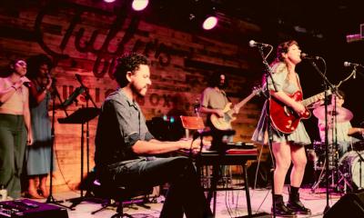 Hannah Stokes and her band onstage playing