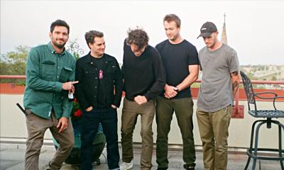 The five members of Barking Spiders stadong on a rooftop deck in St. Augustine