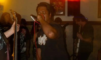 Between You & God performing with lead singer in the forefront