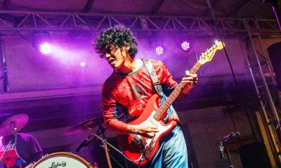 Buboy on stage with his guitar