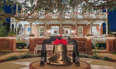 The keeper's house at St. Augustine Lighthouse and Museum as seen from the street at Nights of Lights