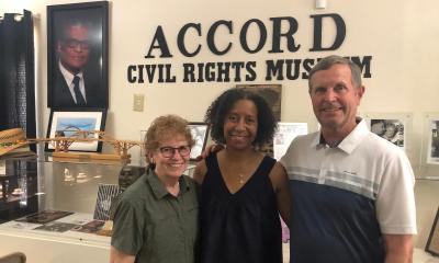 Robert Saalfeld and his wife with a member of the ACCORD Museum board at the museum