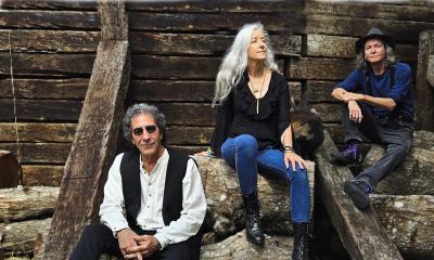 The three-member band Celtic Cunundrum in a ruins in Scottland