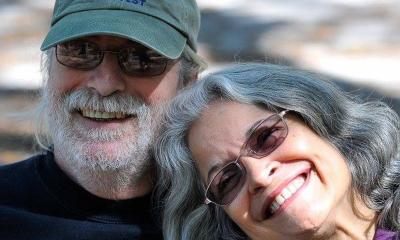 Musicians Bill & Eli Perras smiling, outdoors