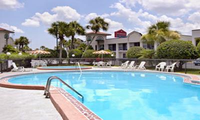 Enjoy the great pool at the Ramada Limited for hot Florida days.