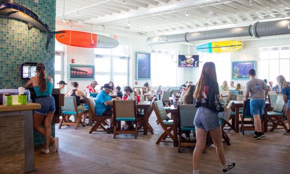 The interior of Salt Life Food Shack on a busy night.