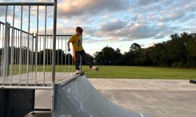 Skate Park with cute little boy on a ramp in Ponte Vedra Beach. 