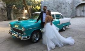 classic car with bride and groom
