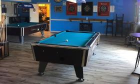 Pelican Pub, with decor and pool tables, empty