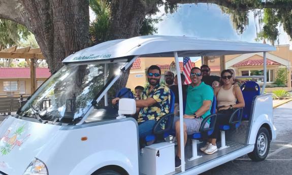 A Pineapple Tour vehicle showing passengers the Senator Tree in St. Augustine