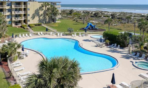 The pools and pool deck at Colony Reef Club