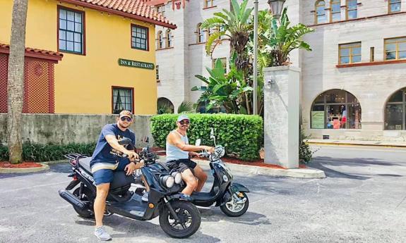 Riding Saint City Scooters in historic downtown St. Augustine.