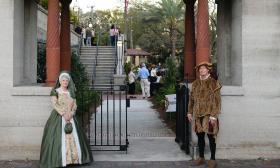 A couple, dressed as early Spanish settlers, at the entrance to the Radzinski Garden