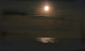 A full moon rises over the waters off Vilano Beach in St. Augustine