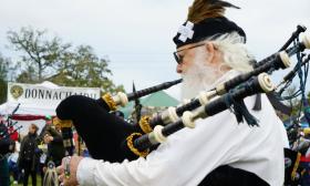A gentleman playing bagpipes at the St. Augustine Celtic Fest