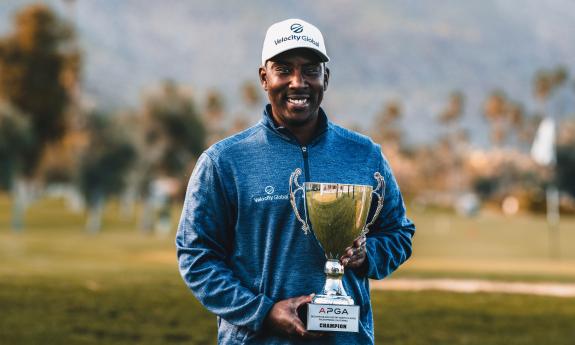 Kevin Hall holding an APGA trophy