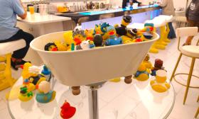 A bath tub full of rubber duckies
