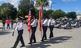 The color guard of local first responders at the start of the Hometown Heroes Motorcycle Ride