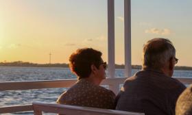 A couple enjoying the sunset aboard a St. Augustine Boat Tours vessel