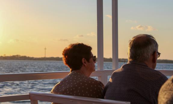 A couple enjoying the sunset aboard a St. Augustine Boat Tours vessel