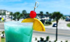 The Blue Hawaiian Drink on the rooftop at Crabby's Beachside in St. Augustine Beach